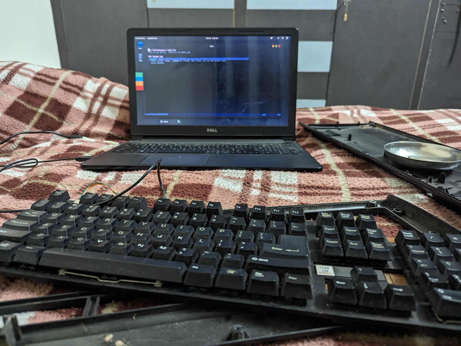 Opening the keyboard, cleaning the internals, and fixing the wiring.